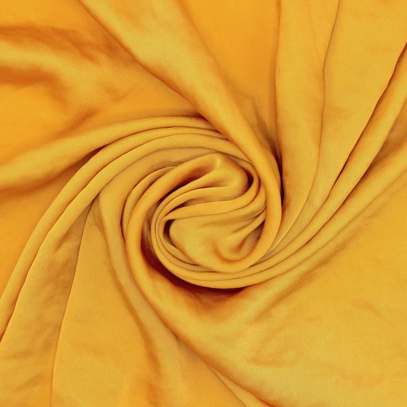 Satin fabric slightly crumpled effect - saffron
