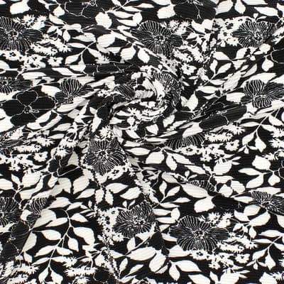 Plissé stof in polyester met bloemen - zwart en wit