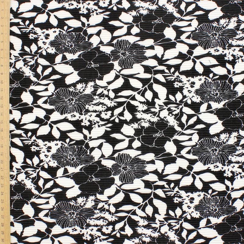 Plissé stof in polyester met bloemen - zwart en wit
