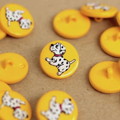 Resin button - yellow with dalmation  