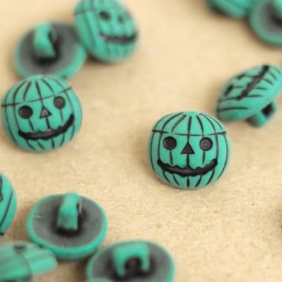 Resin button with Halloween pumpkin - teal