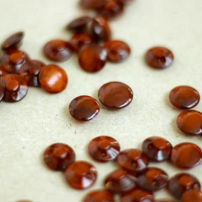 Round resin button - pearly rust-colored