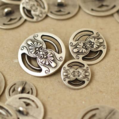 Silver metal button with flowers