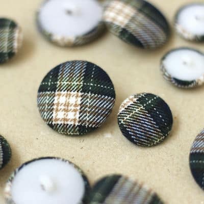 Button covered with scottish fabric 