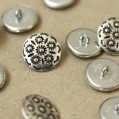 Fantasy button in silver metal