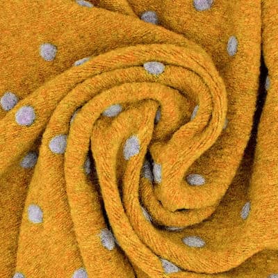Gebreide stof met stippen en aspect van wol - mosterdgeel