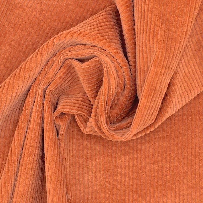 Extensible ribbed velvet fabric - rust-colored