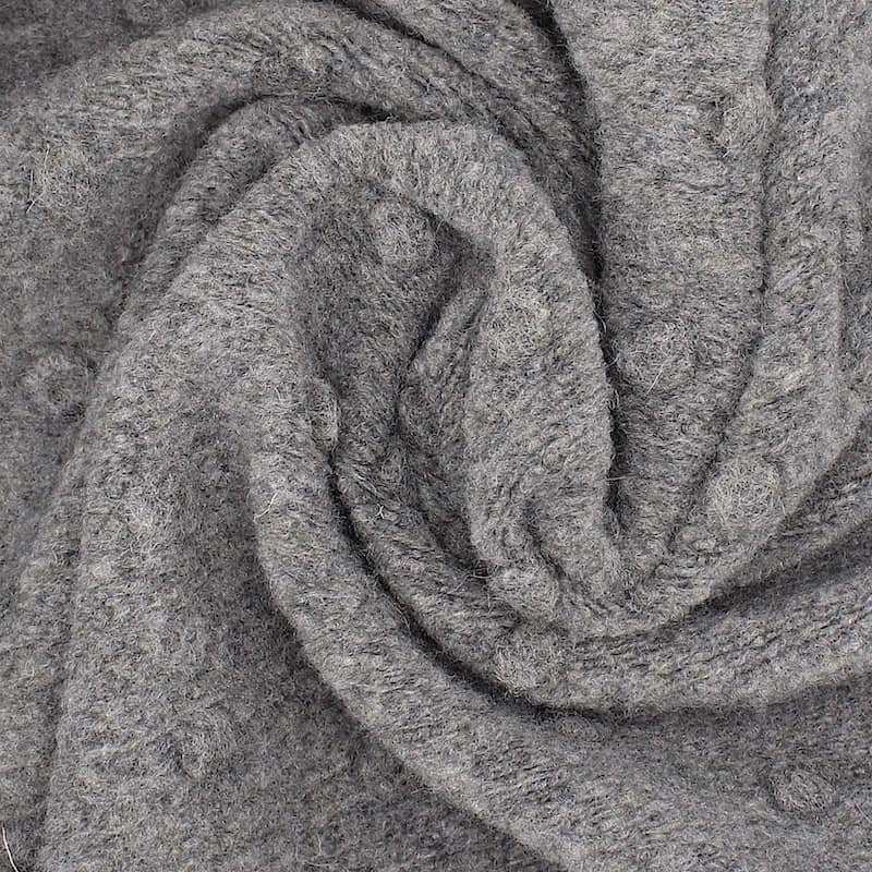 Gebreide stof met stippen en aspect van wol - grijs
