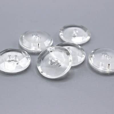 Round button with transparent facets 