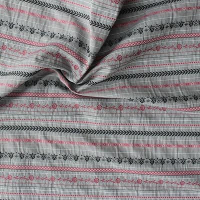 Tissu gris en coton, polyester et viscose à lignes et fleurs roses