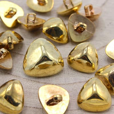 Fantasy triangle button with golden metal aspect