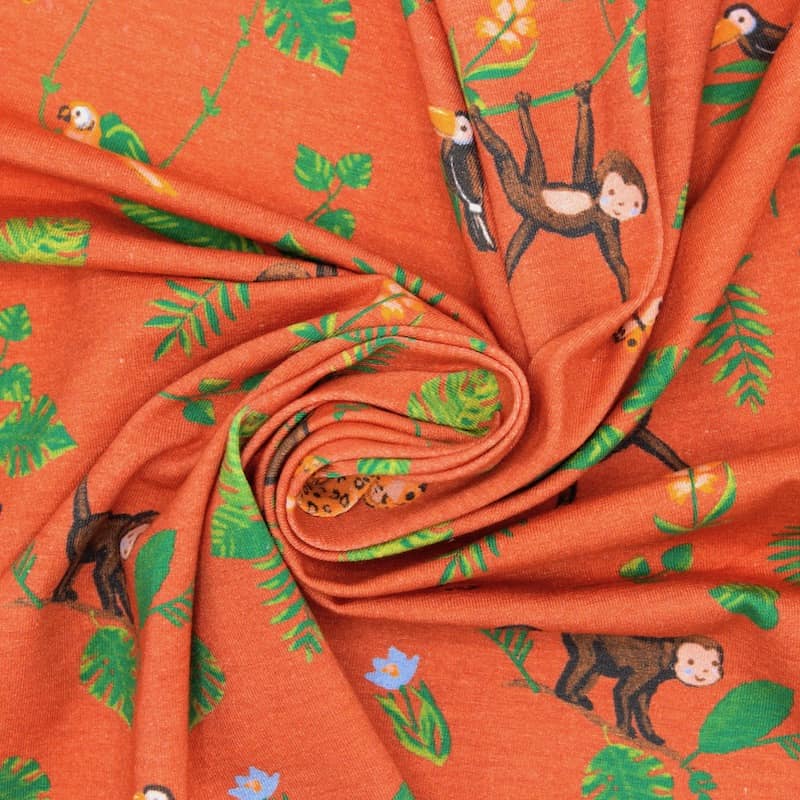 Jersey fabric with animals - brick-colored 