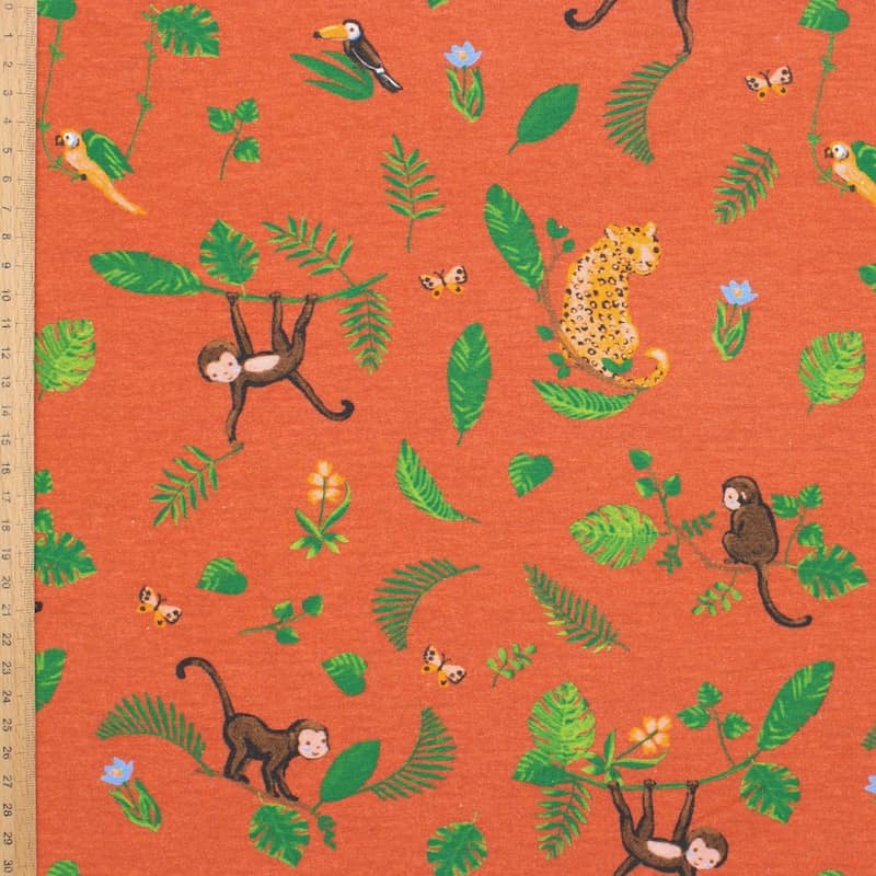 Jersey fabric with animals - brick-colored 