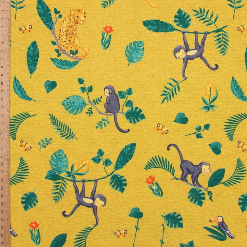 Jersey fabric with animals - mustard yellow