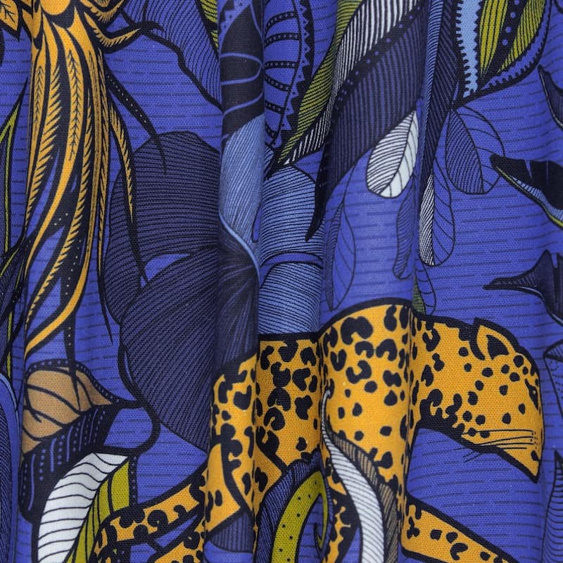 Cotton fabric with animals and foliage - blue 