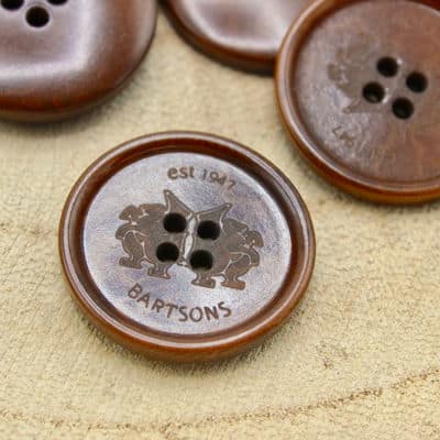 Round button with coat of arms - caramel-colored