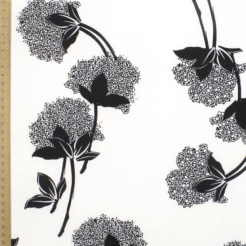 Gebreide stof met bloemen - zwart / wit 
