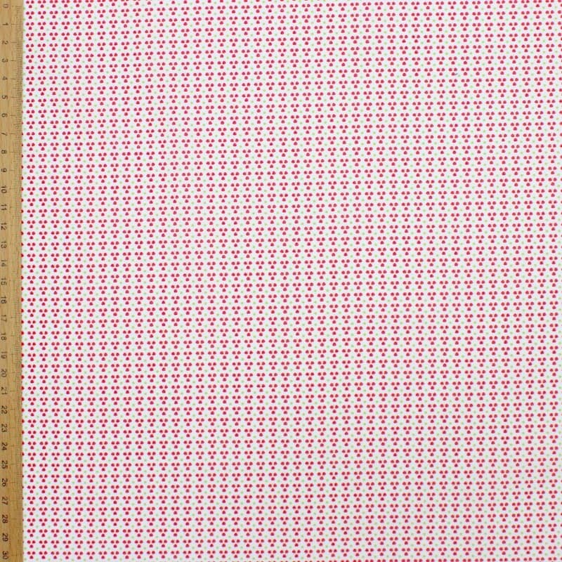 100% cotton fabric with small red patterns