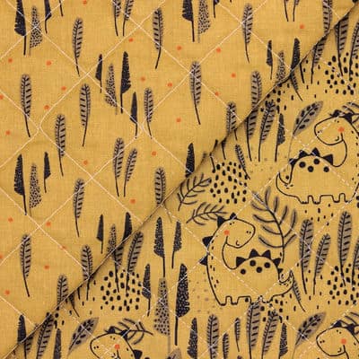 Double-sided quilted fabric with dinos - mustard yellow