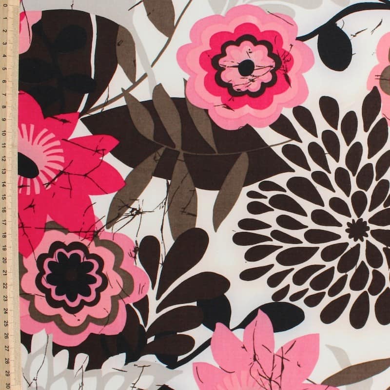 Polyester fabric with black, pink and beige flowers on beige background