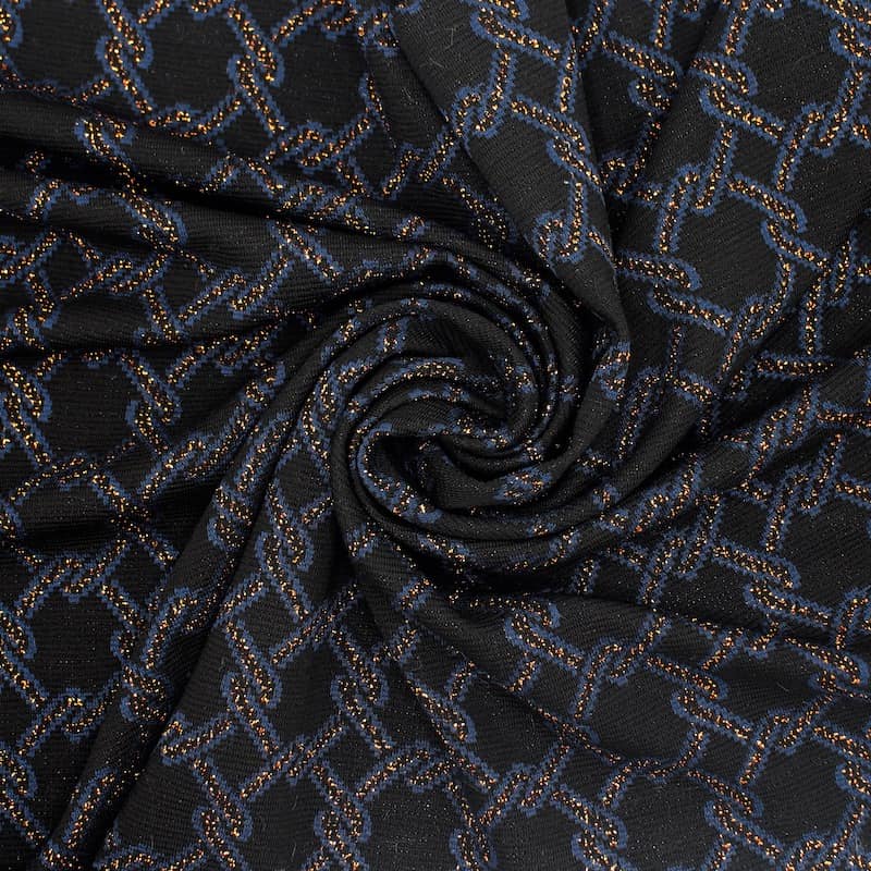 Gebreide stof met grafische print en koperen lurex draad - zwart