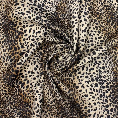 Knit fabric with leopard print
