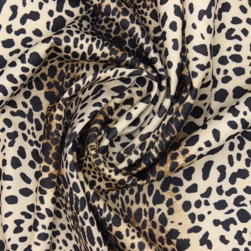 Knit fabric with leopard print