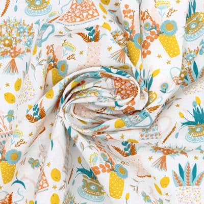 Cotton fabric with garden - blue and rust-colored 