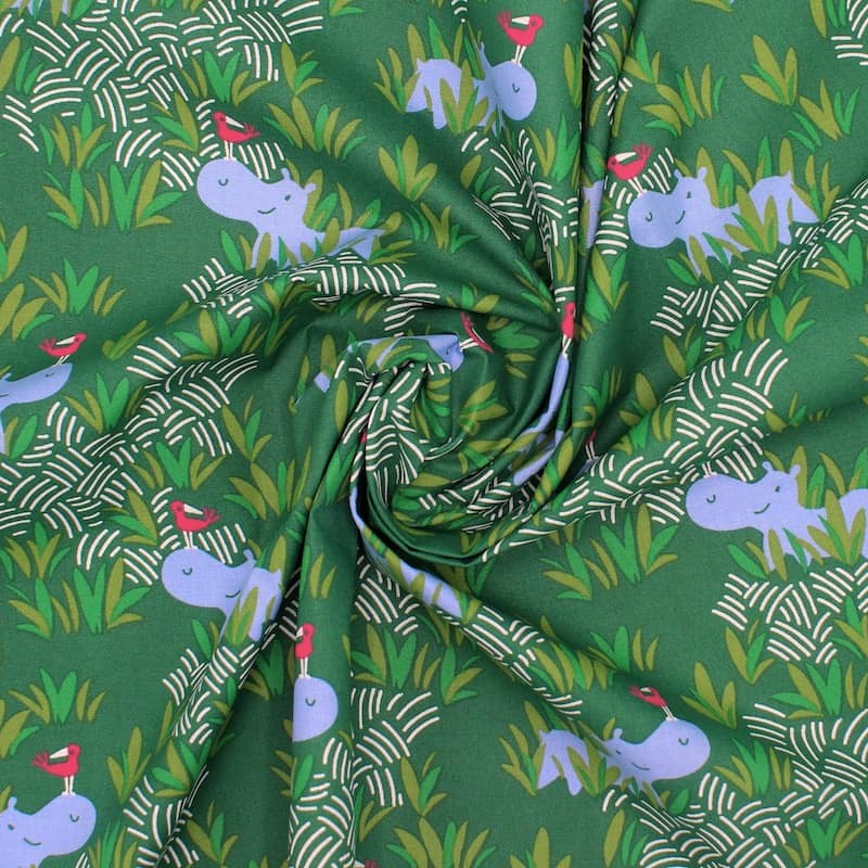 Cretonne fabric with hippos - green