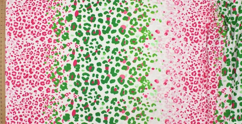 Polyester knit fabric with animal print - fuchsia and green 