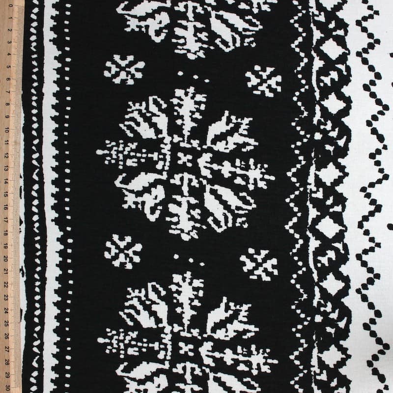 Viscose en elastaan stof met witte geometrische patroon op zwarte achtergond