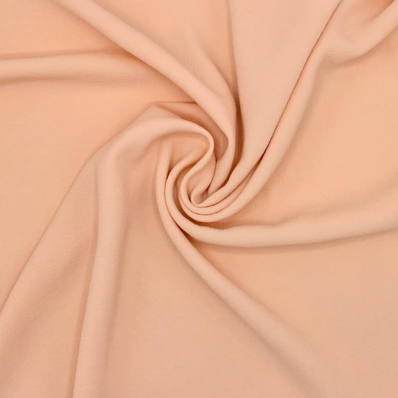 Fabric with crêpe aspect - salmon-colored