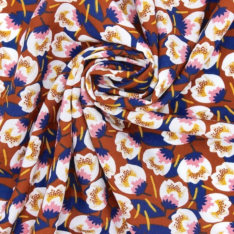 Viscose fabric with flowers - rust-colored