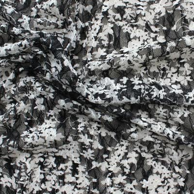 Polyester and elasthanne veil fabric with black and white flowers