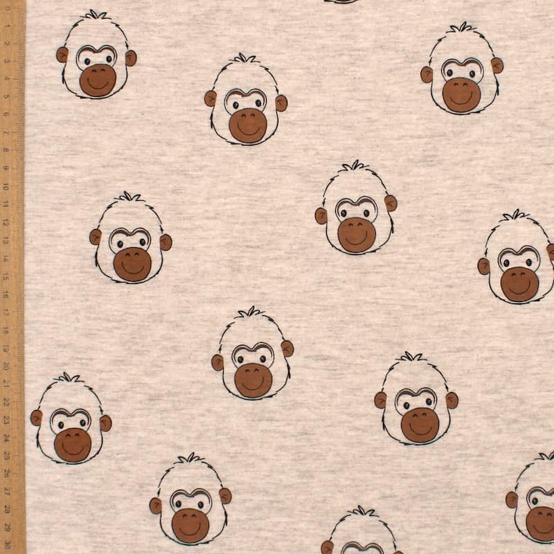Jersey fabric with monkeys - light beige 