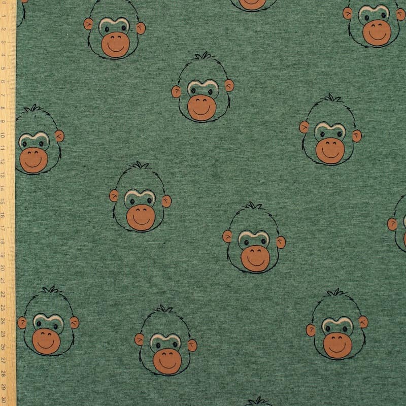 Jersey fabric with monkeys - green