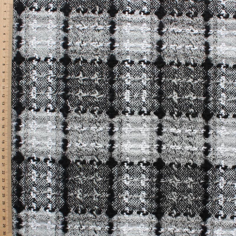 Viscose, wool and polyester fabric with black and white checkered design