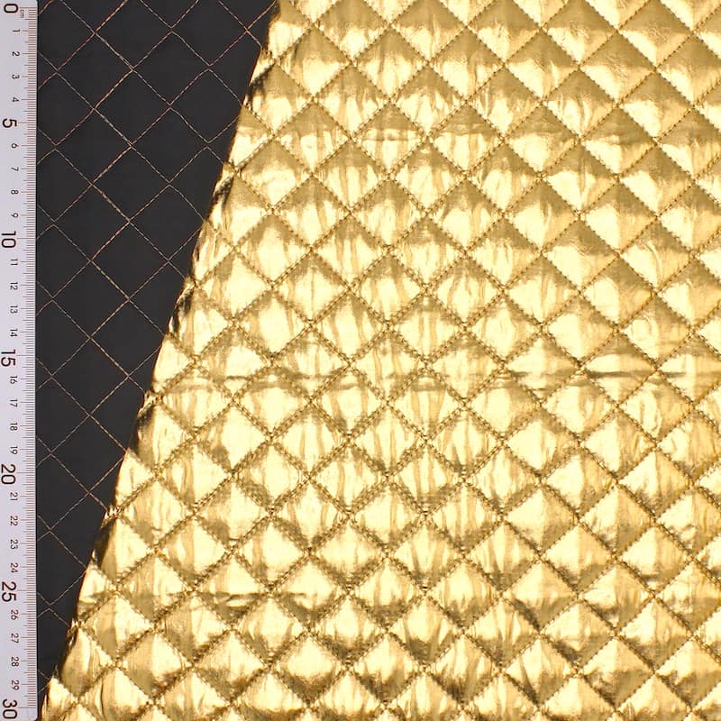 Metallic quilted fabric with black wrong side - gold 