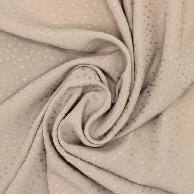 Viscose jacquard fabric with dots - beige 